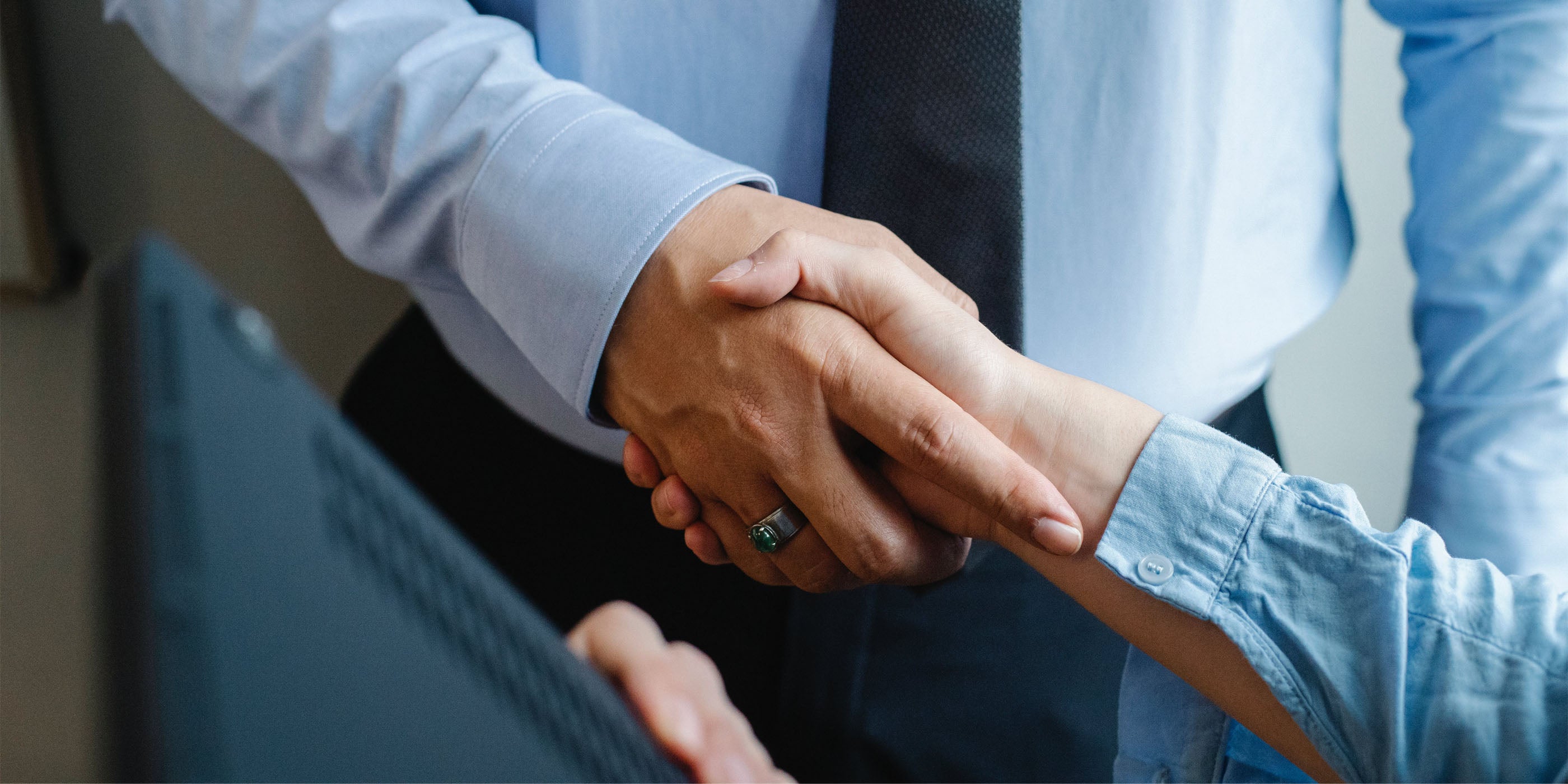 Shaking hands after completing a successful mortgage deal